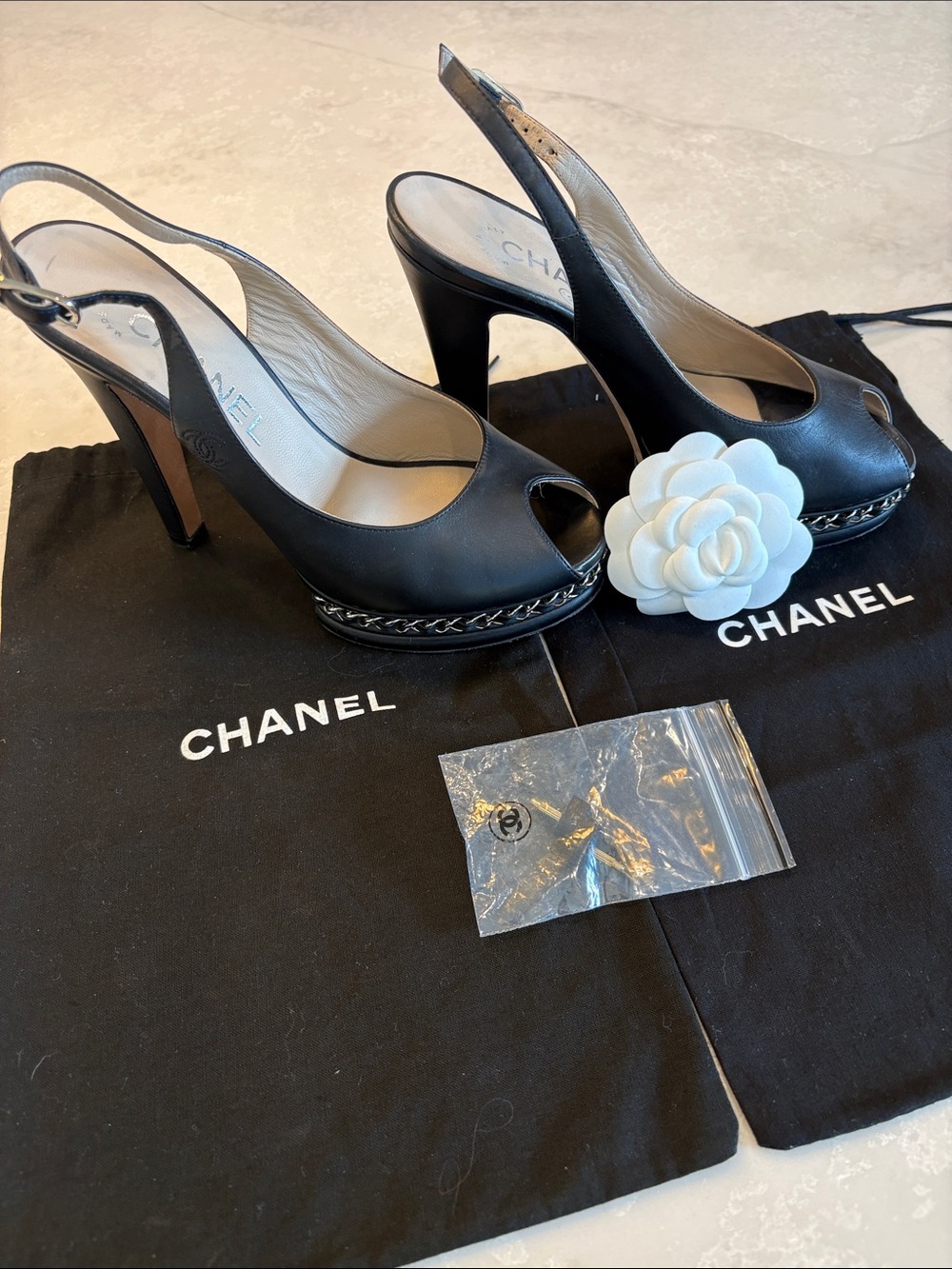 CHANEL Black Leather Slingback Peep-Toe Heels with Chain Detail
